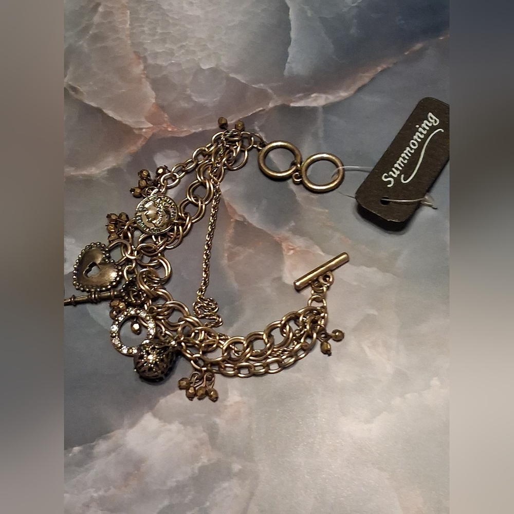 Gold Tone Charm Bracelet